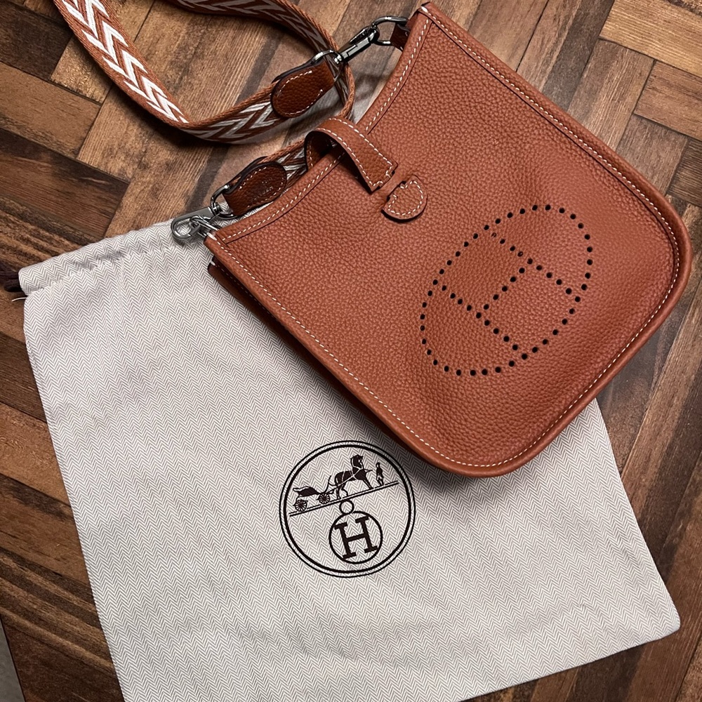 Brown crossbody calf leather H-bag with decorative strap